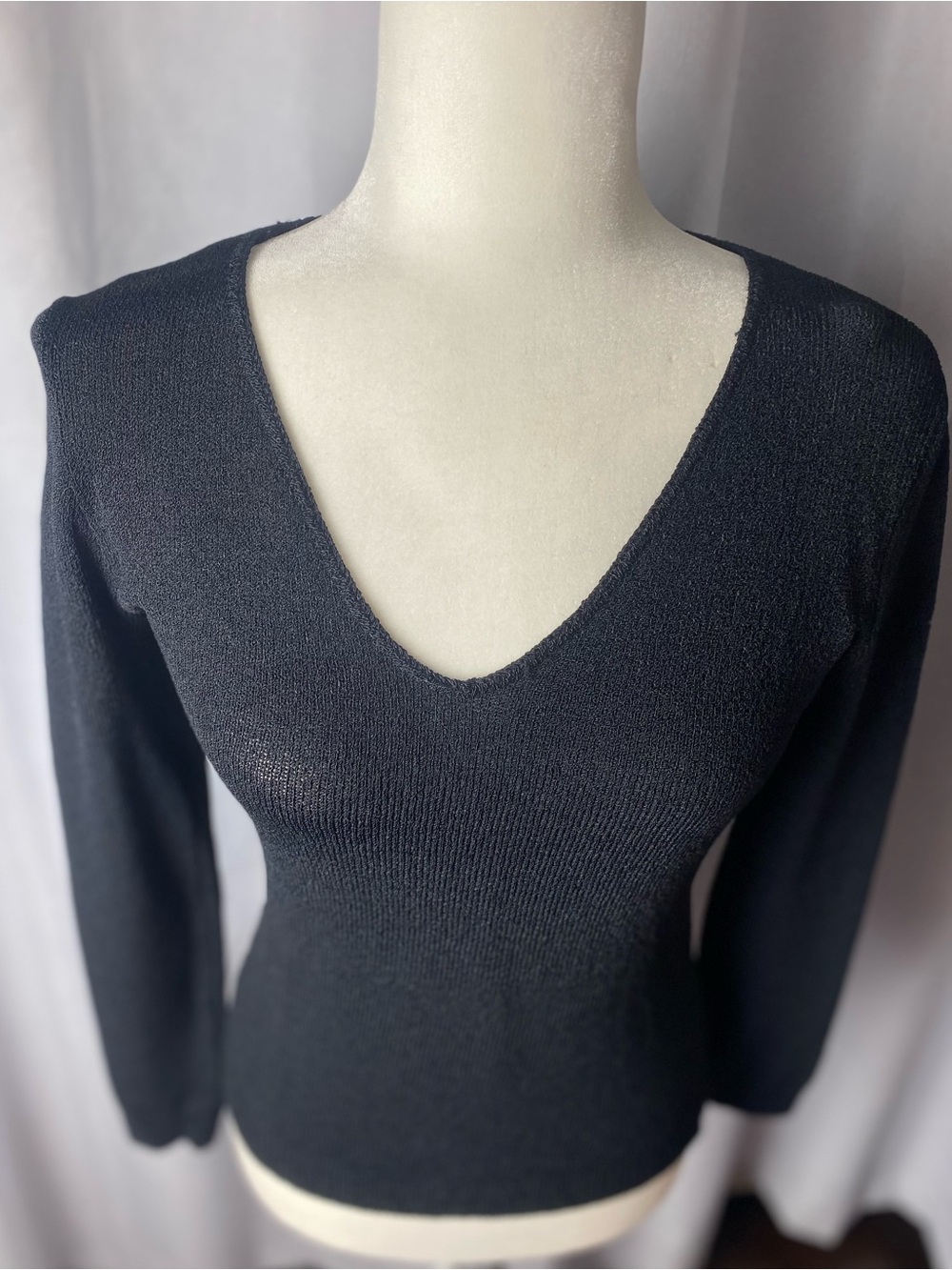 BETTE PAIGE knit top.